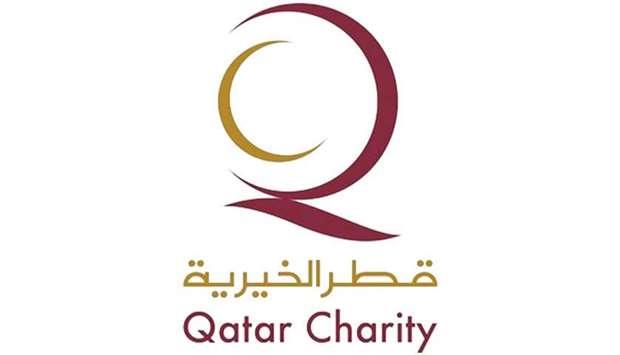 In Kyrgyzstan, Qatar Charity gives school backpacks to orphans.