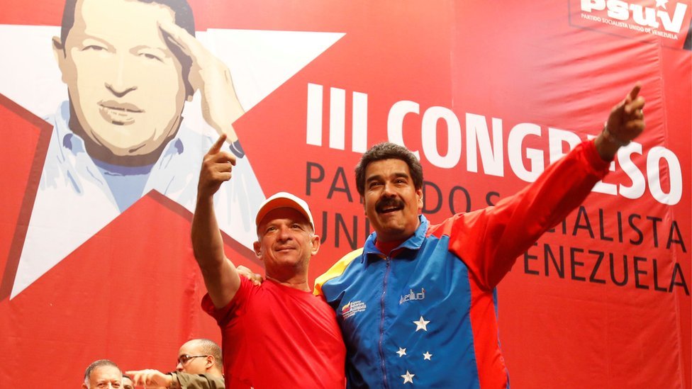 Hugo Carvajal and Nicolás Maduro.