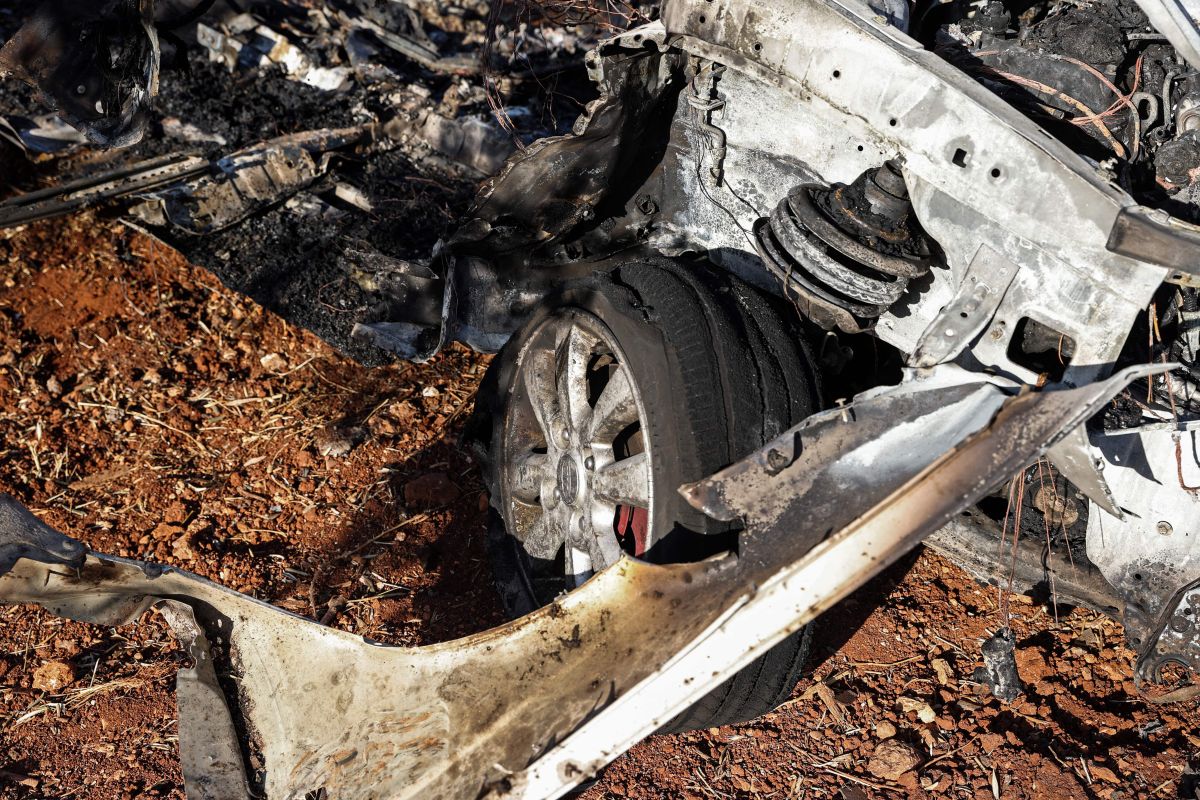 A car destroyed in a US attack on Al Qaeda in Syria on September 20, 2021.